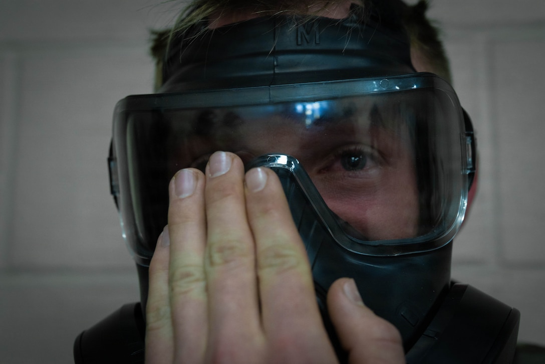 A U.S. Marine with 4th Medical Battalion, 4th Marine Logistics Group, Marine Forces Reserve, clears a gas mask during a Reserve Mobilization Exercise, East Miramar, California, March 3, 2026. The week-long exercise validates the battalion’s ability to rapidly activate personnel and equipment, ensuring the unit can deliver ready forces in response to a national crisis. (U.S. Marine Corps photo by Lance Cpl. Claire Cheney)