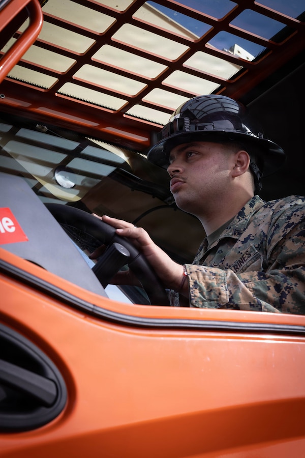 U.S. Marine Corps Lance Cpl. Alexis Moncayo, a motor vehicle operator with 4th Medical Battalion, 4th Marine Logistics Group, Marine Forces Reserve, operates a forklift during a Reserve Mobilization Exercise, San Diego, California, March 3, 2026. The week-long exercise validates the battalion’s ability to rapidly activate personnel and equipment, ensuring the unit can deliver ready forces in response to a national crisis. (U.S. Marine Corps photo by Lance Cpl. Claire Cheney)