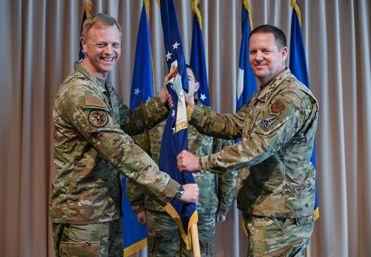 Brig. Gen. Jason Voorheis assumes responsibility of the Department of the Air Force Portfolio Acquisition Executive for Command, Control, Communications and Battle Management from Lt. Gen. Luke Cropsey, military deputy for the Office of the Assistant Secretary of the Air Force for Acquisition, Technology and Logistics, during a ceremony here, March 18, 2026. Voorheis officially assumed leadership of C3BM on Feb. 2, 2026, and the ceremony served as the ceremonial transfer of authority and responsibility.