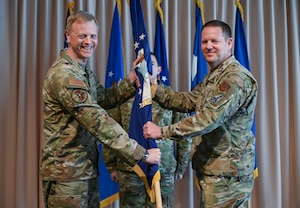 Brig. Gen. Jason Voorheis assumes responsibility of the Department of the Air Force Portfolio Acquisition Executive for Command, Control, Communications and Battle Management from Lt. Gen. Luke Cropsey, military deputy for the Office of the Assistant Secretary of the Air Force for Acquisition, Technology and Logistics, during a ceremony here, March 18, 2026. Voorheis officially assumed leadership of C3BM on Feb. 2, 2026, and the ceremony served as the ceremonial transfer of authority and responsibility.