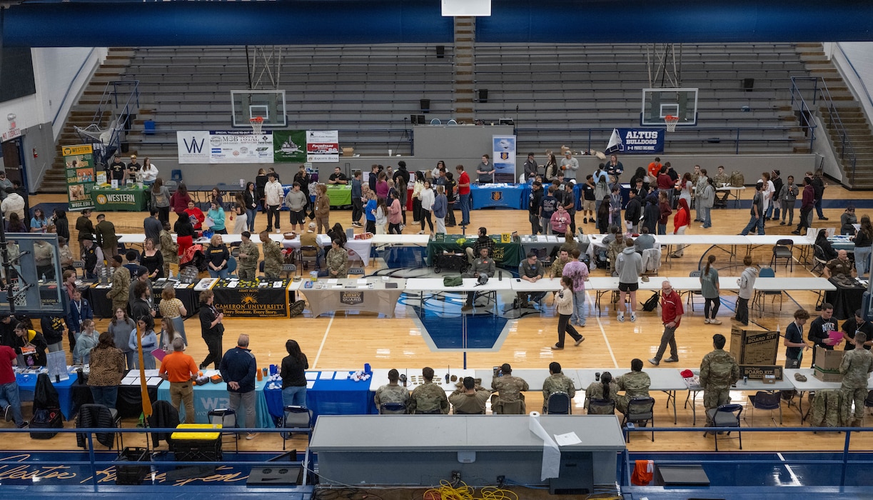 Attendees walk around at a career fair held at Altus High School, Altus, Oklahoma, March 11, 2026. Altus Air Force Base Airmen from various squadrons attended the career fair to speak with students about their experience serving in the U.S. Air Force. (U.S. Air Force photo by Airman 1st Class Emma Wright)