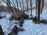 Air National Guard Security Forces members ruck through the rigorous Cold Weather Operations Course (CWOC) at Camp Ripley, Minnesota.