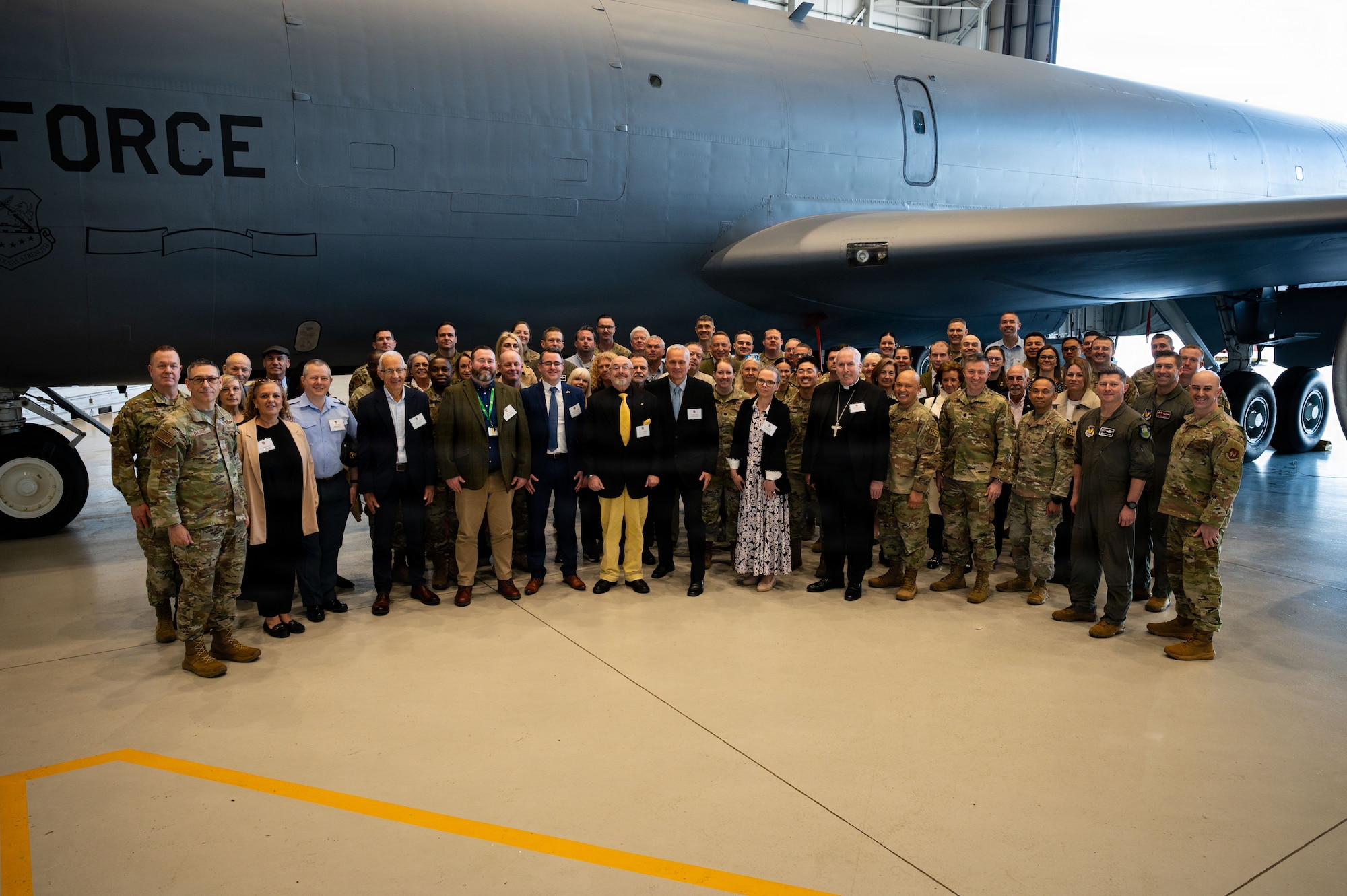 Honorary Commanders and Team Mildenhall pose during the Honorary Commanders Induction Ceremony at RAF Mildenhall, England, March 19, 2026.
