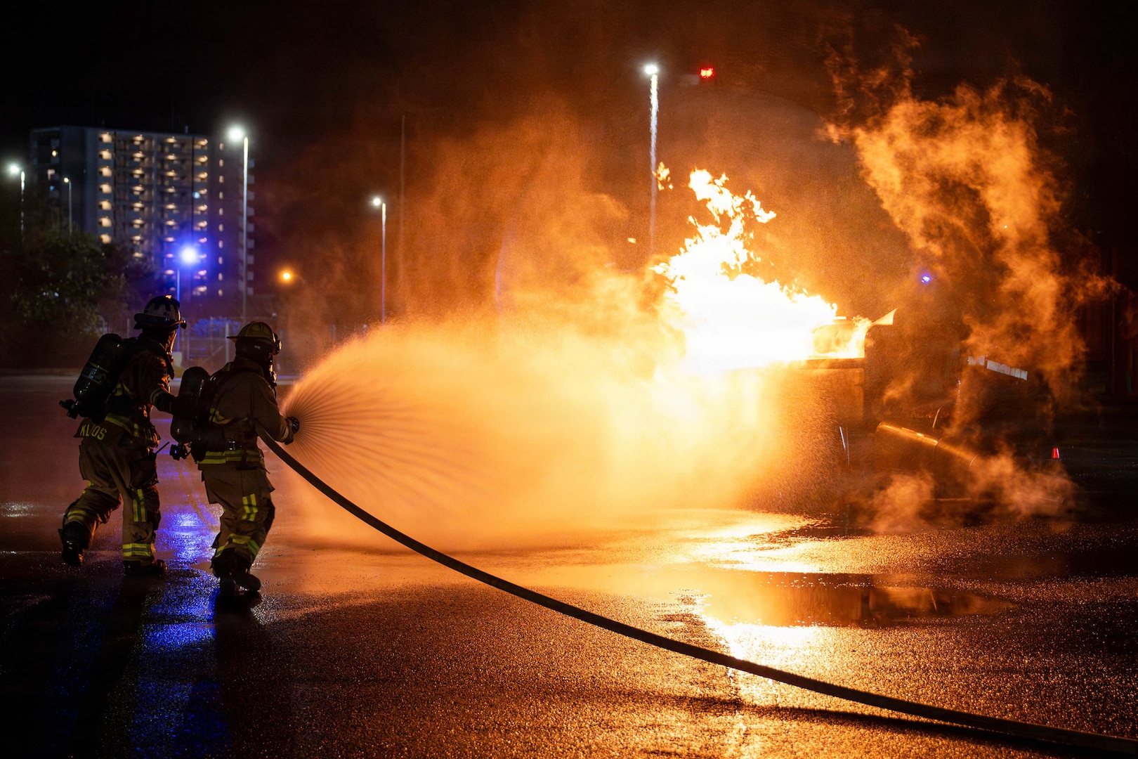 Airmen fighting fire