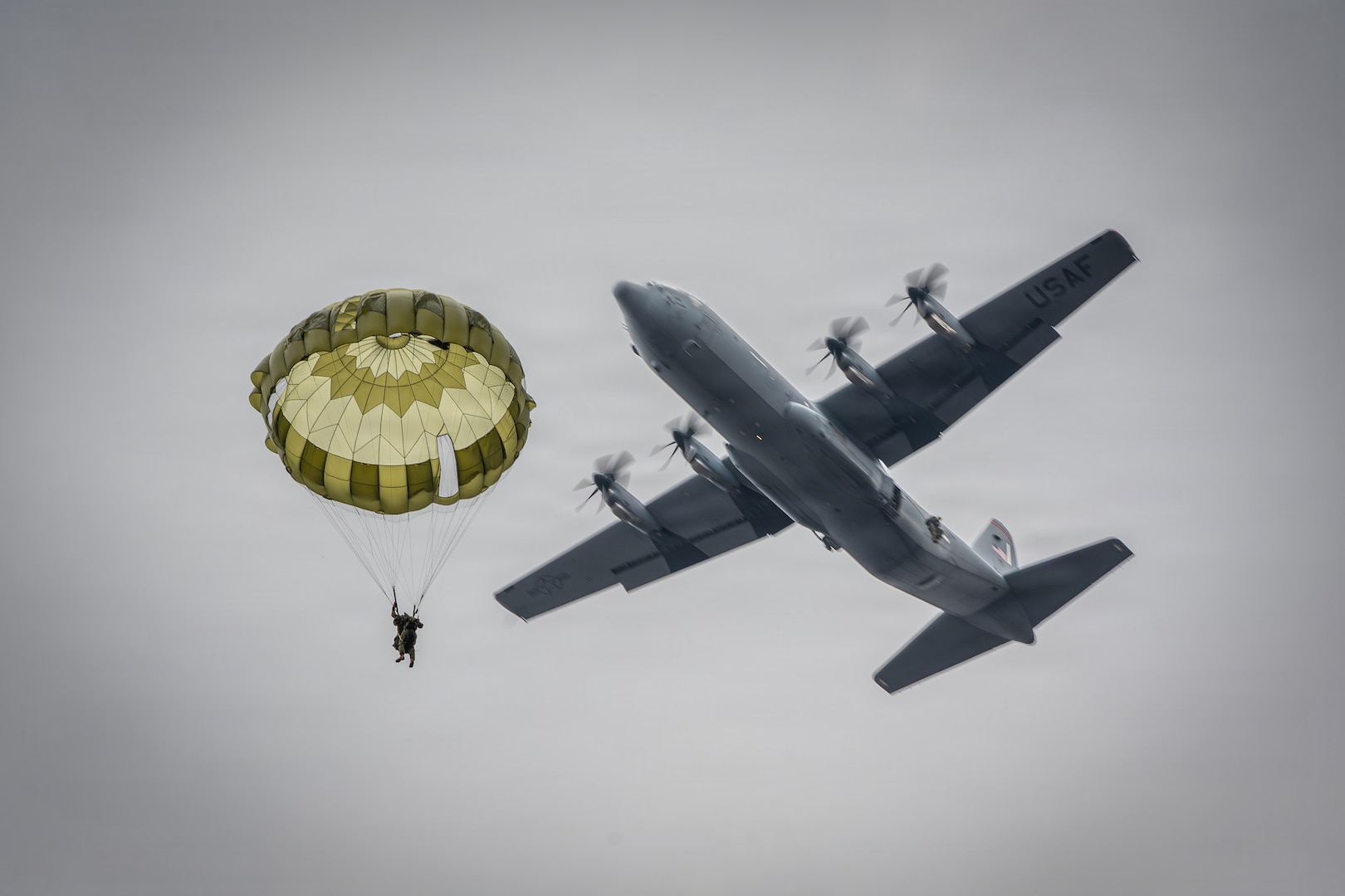 Paratrooper dropping from C-130