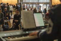Audience members enjoy a performance of The U.S. Air Force Band’s Singing Sergeants at the Smithsonian National Museum of American History in Washington, D.C., March 12, 2026. The Singing Sergeants celebrated American musical theater contributions as part of the 250th birthday celebration of the United States. (U.S. Air Force photo by Staff Sgt. Jordan Powell)