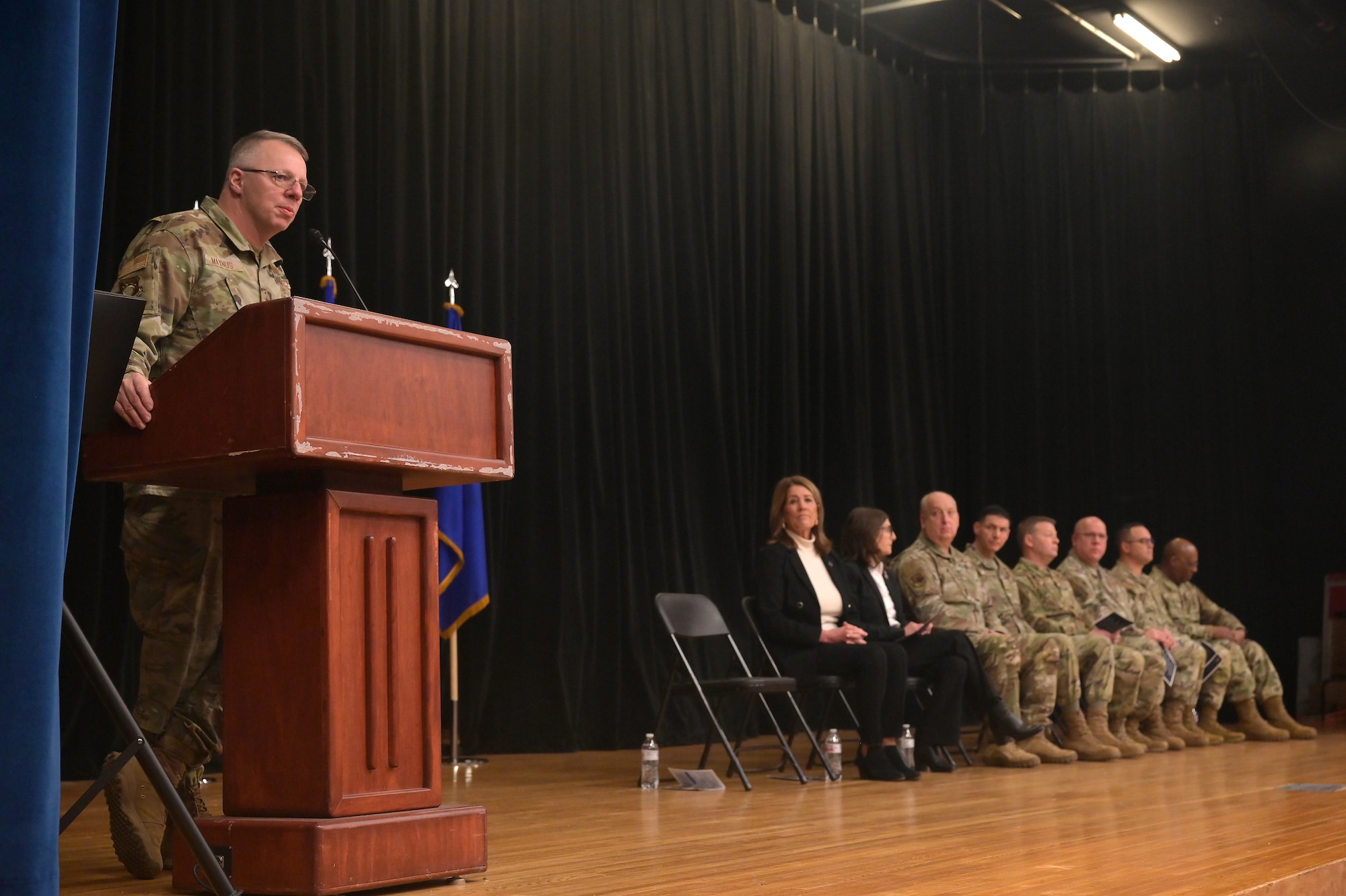 U.S. Air Force Brig. Gen. Clarence Maynus, chief of staff of the Ohio Air National Guard,  speaks to the airmen of the 123rd Air Control Squadron during a homecoming ceremony Dec. 7, 2025 in the auditorium at Muntz Hall at the University of Cincinnati campus in. Blue Ash, Ohio. Nearly 300 airmen assigned to the 123rd Air Control Squadron returned home from a six-month deployment supporting U.S. Air Forces Central Command. (U.S. Air Force photo by Shane Hughes)