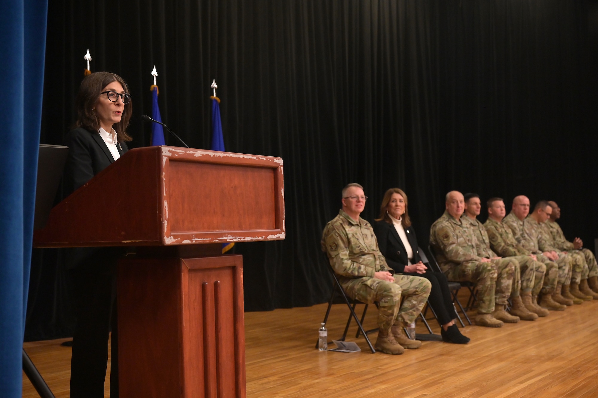 Karen Brownlee, state representative of House District, speaks to the airmen of the 123rd Air Control Squadron during a homecoming ceremony Dec. 7, 2025 in the auditorium at Muntz Hall at the University of Cincinnati campus in. Blue Ash, Ohio. Nearly 300 airmen assigned to the 123rd Air Control Squadron returned home from a six-month deployment supporting U.S. Air Forces Central Command. (U.S. Air Force photo by Shane Hughes)