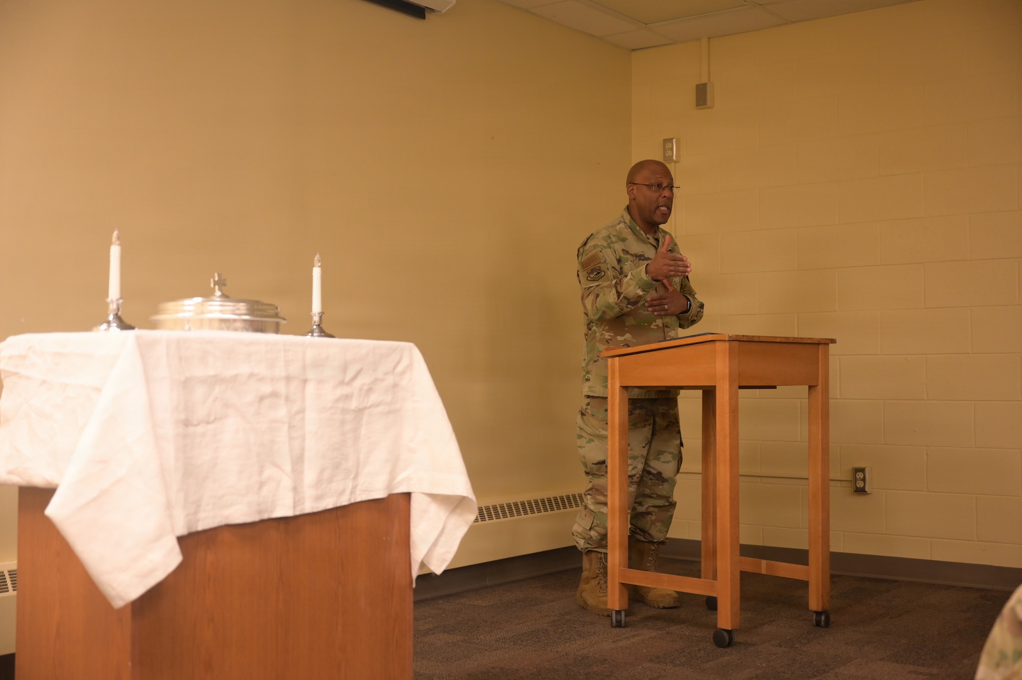 Lt. Col. Joseph Branch, 178th Wing chaplain, addresses Airmen during his final chapel service at Springfield-Beckley Air National Guard Base, Ohio, Feb. 8, 2026. Branch served as the wing chaplain for 10 years before departing for a new assignment at U.S. Southern Command.