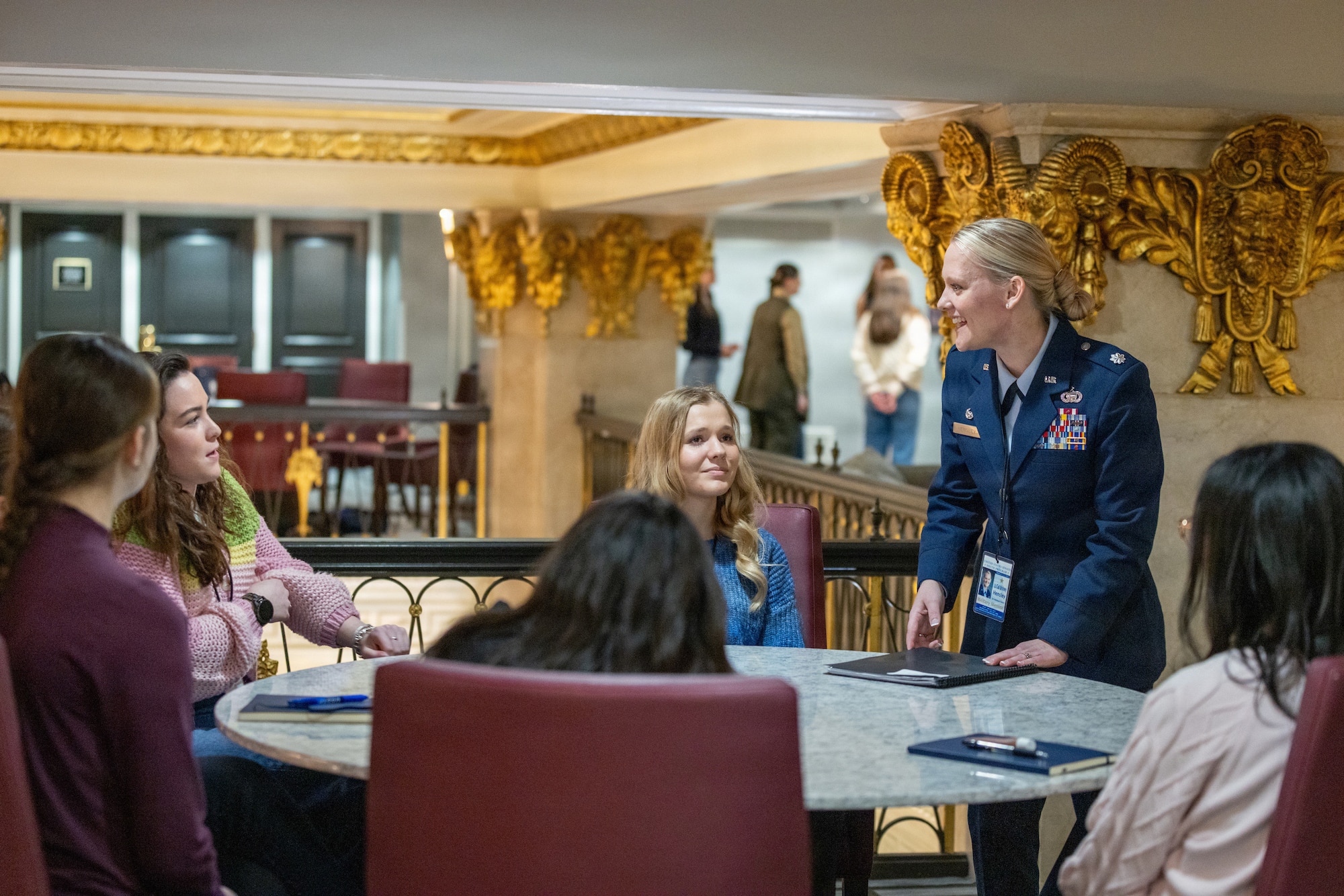 Lt. Col. Brittany Hensley, commander of the 126th intelligence Squadron assigned to the 178th Wing teaches her student delegates as part of the United States Youth Senate Program in Washington D.C., on March 1, 2025. For many of the delegates, this interaction is their first personal connection with a member of the armed forces, a core component of the program's mission. (Photo by Jakub Mosur and Erin Lubin)