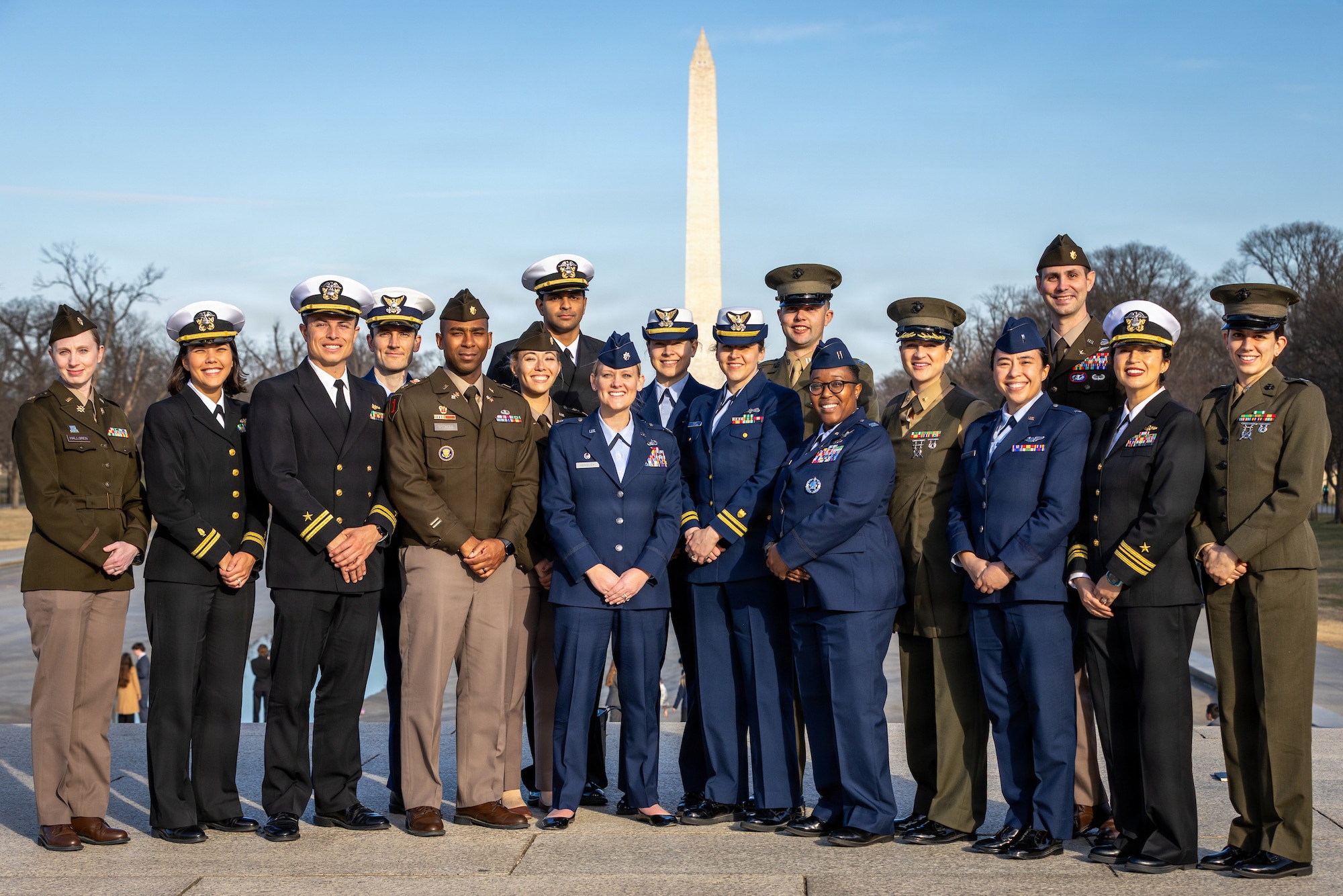 The 2025 United States Senate Youth Program military mentor team poses for a group photo in Washington, D.C. led by United States Air Force Lt. Col. Brittany Hensley, front row, center, on March 4, 2025. The 17 officers represent all branches of the armed forces and serve as guides for their 104 high school delegates. (Photo by Jakub Mosur and Erin Lubin).