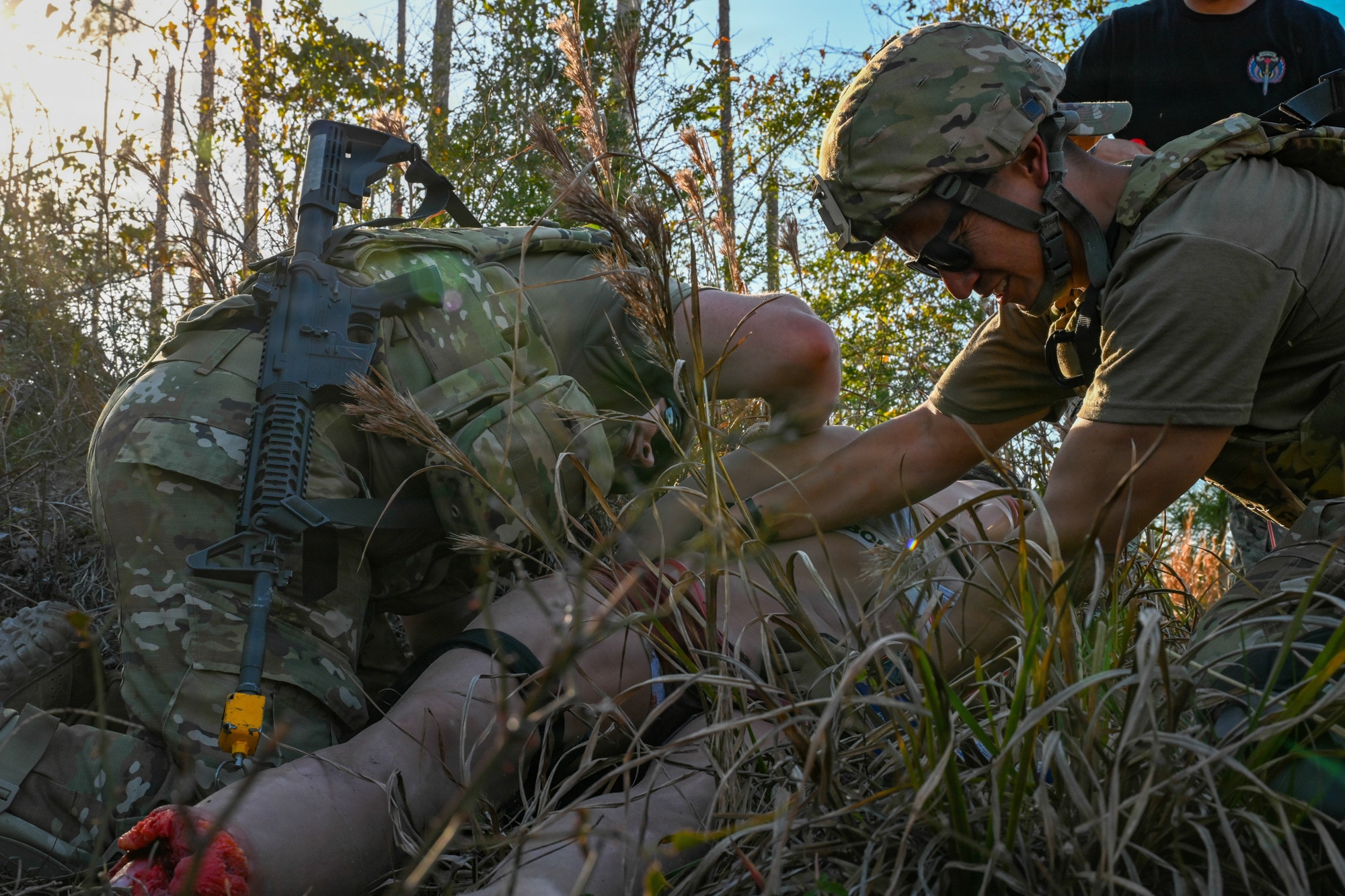 U.S. Air Force medics assigned to the 31st Combat Air Base Squadron participate in specialized pre-deployment training during the 31st Air Task Force’s second field training exercise at Tyndall Air Force Base, Florida, Feb. 9, 2026. The exercise marked a unique partnership between a Unit of Action and special operations medics, enabling expanded learning opportunities and significant achievement of training objectives. (U.S. Air Force photo by Senior Airman Ty Pilgrim)