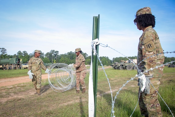 Georgia Army National Guard Soldiers assigned to the 148th Brigade Support Battalion, 48th IBCT close the entry control point to the recently established brigade support area June 21, 2022 while supporting XCTC 22-05 in Fort Stewart, Ga.