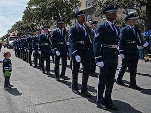A young boy watches the U.S. Air Force Honor Guard march during the Savannah St. Patrick’s Day parade in Savannah, Ga., March 17, 2026. The parade was the 202nd annual St. Patrick’s Day celebration in the city and brought tens of thousands of guests and participants to Savannah for the event. (U.S. Air Force photo by Tech. Sgt. Sergio A. Gamboa)