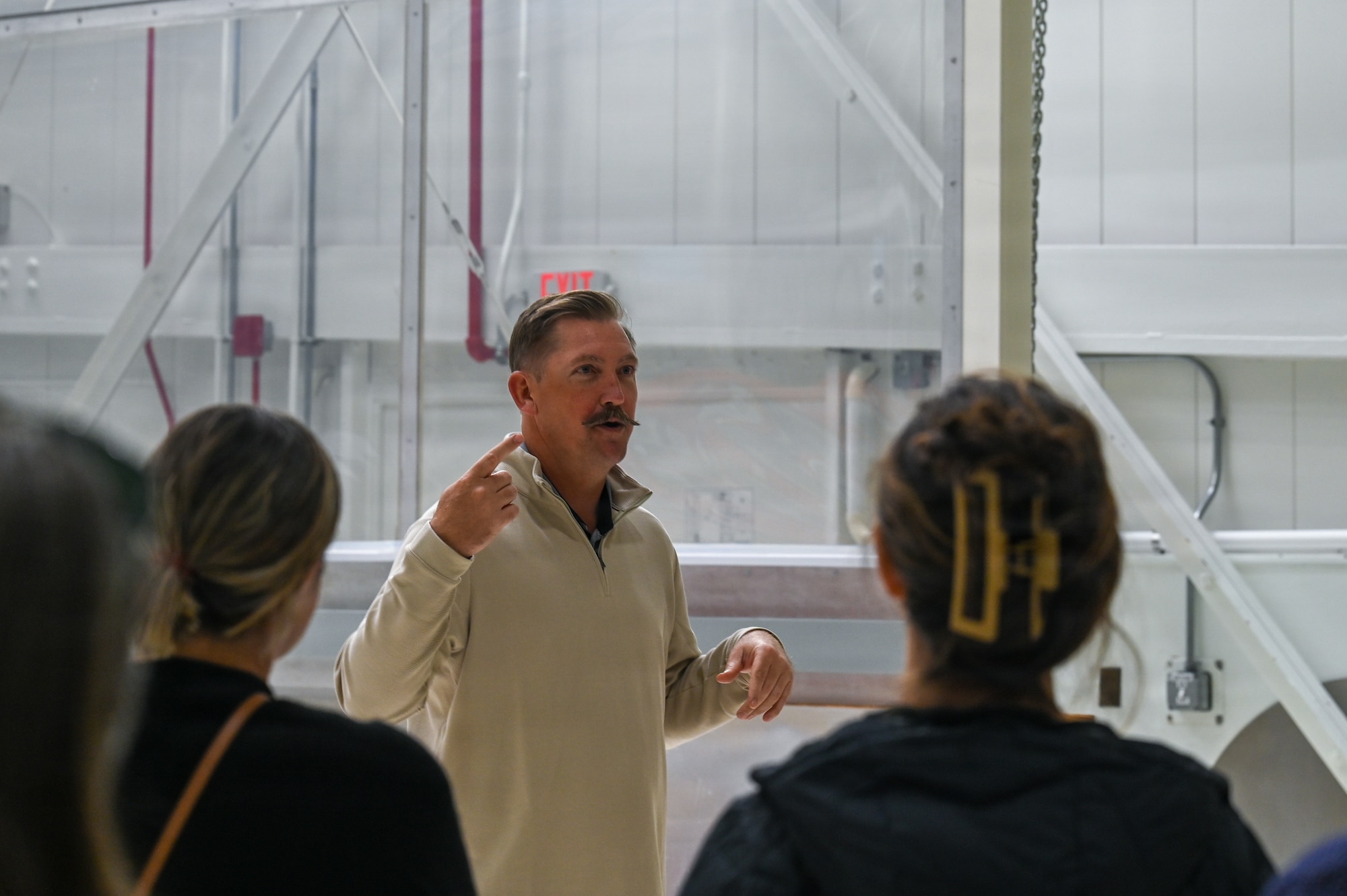 Daye Hoffman, NASA Launch Service Program’s organizational director at Vandenberg, gives a tour to the Santa Maria Chamber of Commerce, inside NASA’s LSP Clean Room.