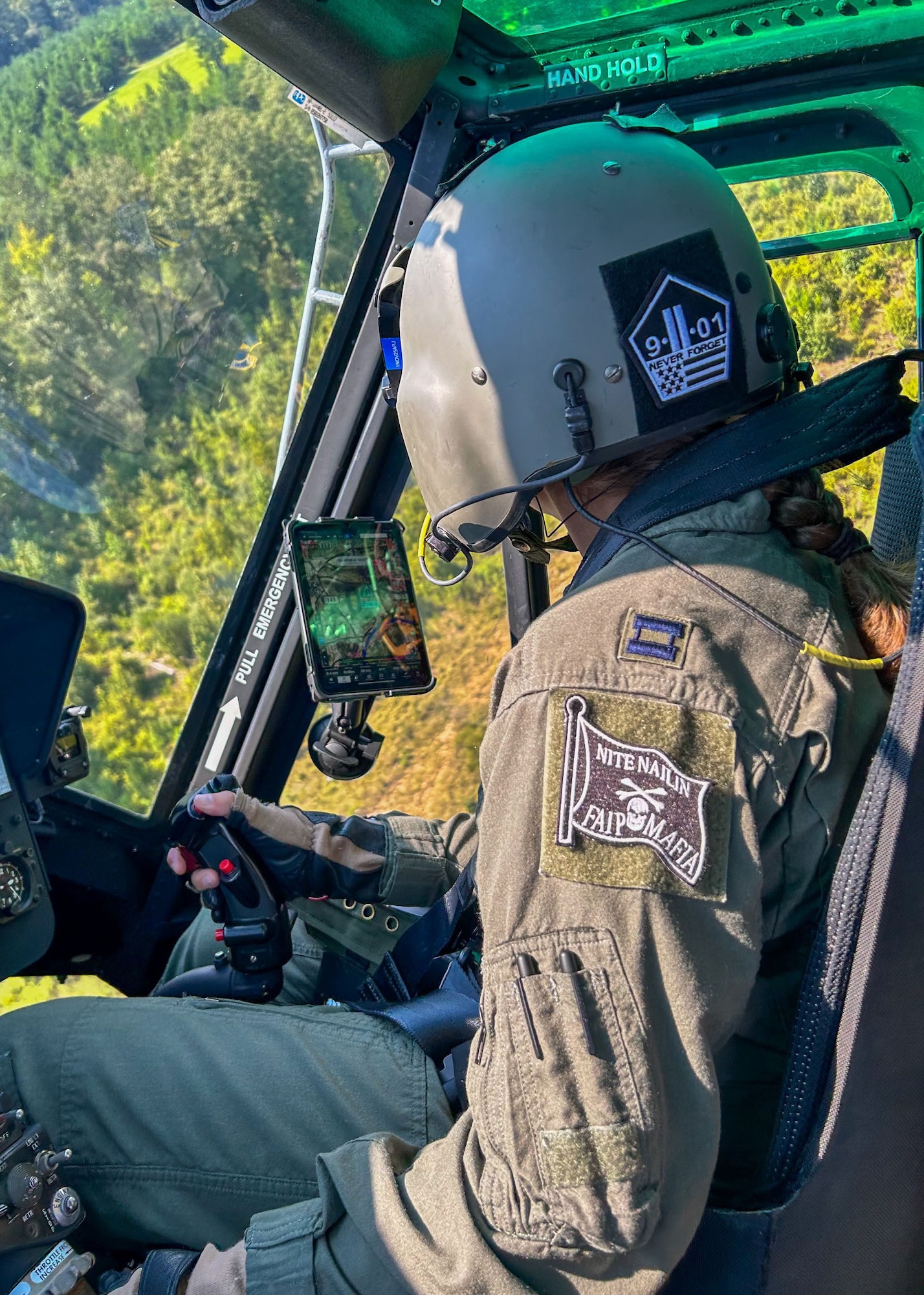 Born flies a TH-1H Huey.