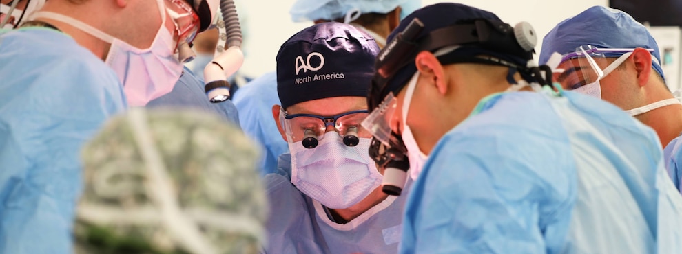 A surgical team in the operating room at Naval Medical Center San Diego.