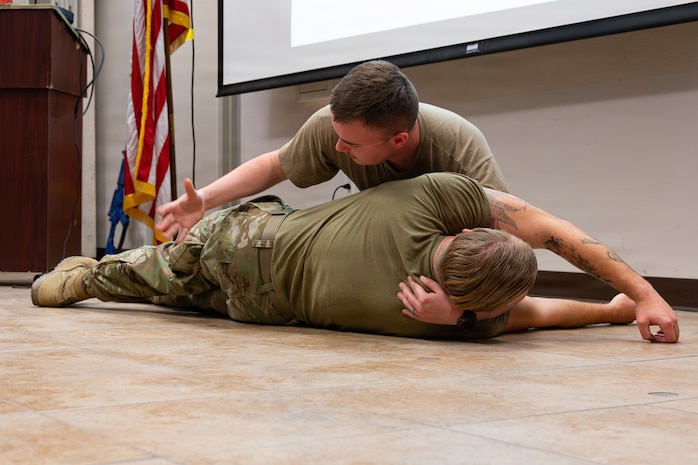 Person care for other person on ground