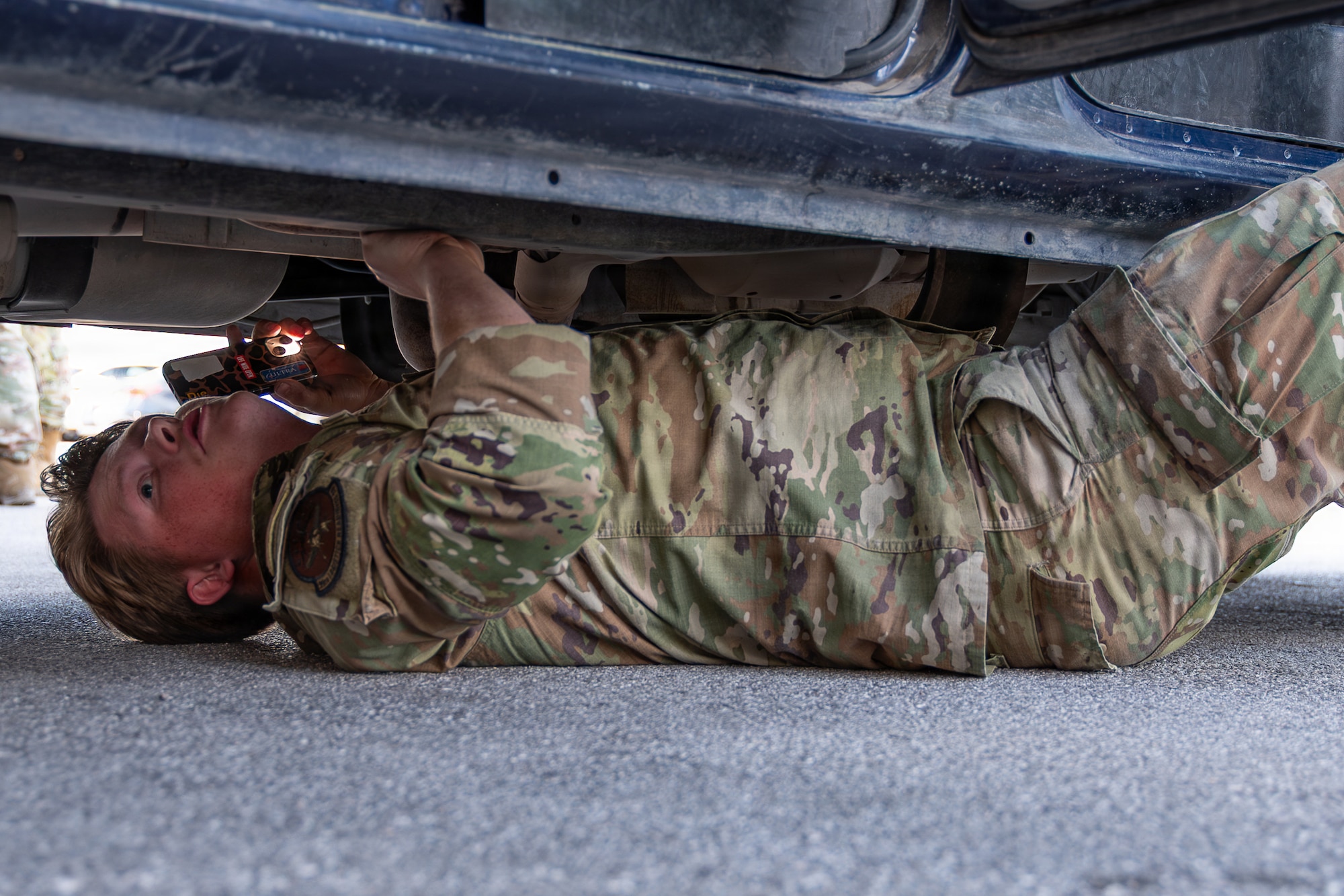Person search under car