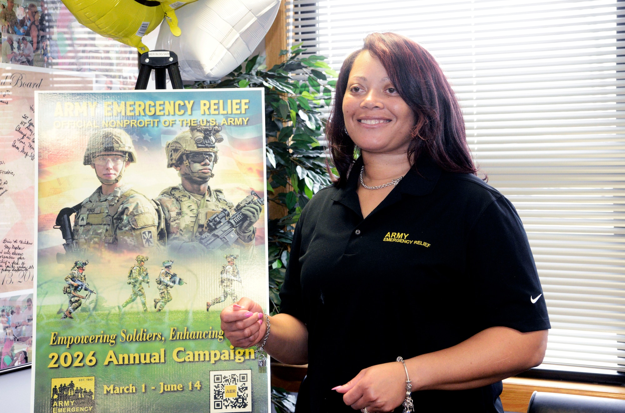 Makeda Mitchell, U.S. Army Support Activity Fort Dix Army Emergency Relief officer, explains how U.S. Army Soldiers can both contribute to and receive support from AER during the campaign kick-off ceremony at Joint Base McGuire-Dix-Lakehurst, N.J., March 5, 2026. Founded in 1942, AER is the Army’s official nonprofit organization which provides financial assistance to Soldiers and their families during financial hardship through donations. (U.S. Air Force photo by Kris Patterson)
