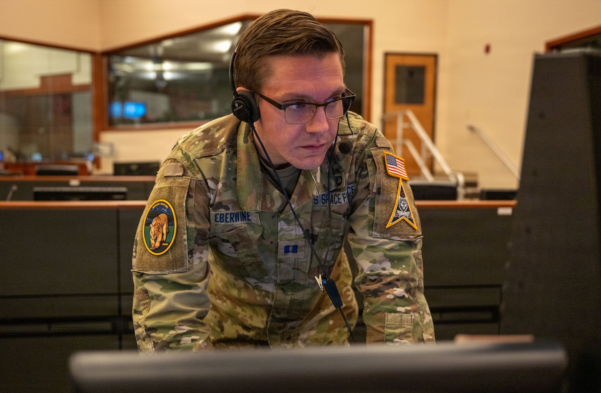 U.S. Space Force Capt. George Eberwine, Space System Command (SSC) System Delta 89 (SYD 89) Space Safari mission manager, monitors exercise player actions in the Western Range Operations Control Center during a Tactically Responsive Space (TacRS) field training exercise (FTX) at Vandenberg Space Force Base, Calif., Jan. 9, 2026. The VICTUS DIEM exercise was created to generate additional opportunities that exercise rapid launch capabilities with commercial partnership integration into the government process. The results provide a continued focus on refining and codifying a repeatable process for rapid launch as part of the broader VICTUS program. (U.S. Space Force photo by Senior Airman Kevin Hernandez)