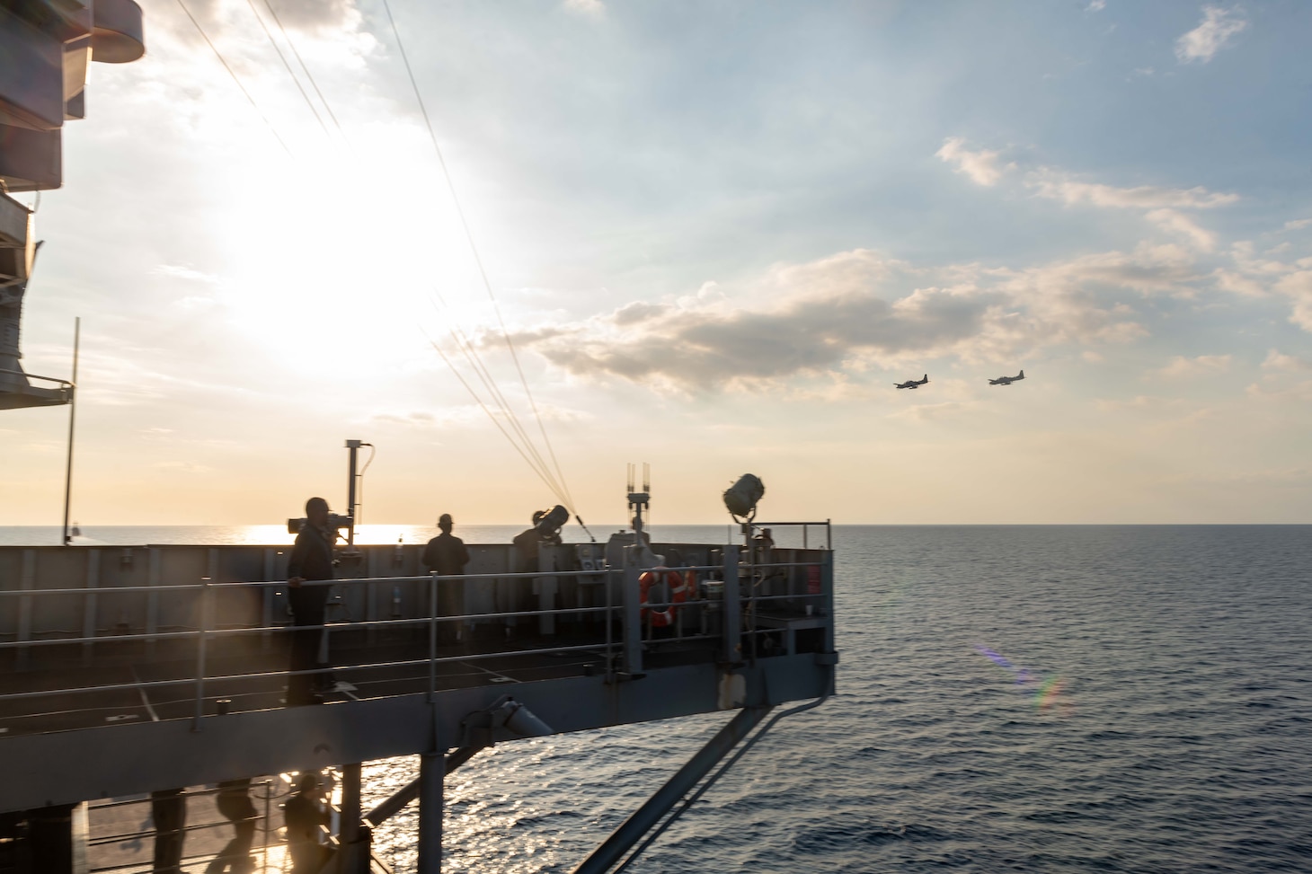 Two Armed Forces of the Philippines A-29 Super Tucano light-attack aircraft conduct a flyover of U.S. 7th Fleet flagship USS Blue Ridge (LCC 19) in Manila Bay during the Maritime Cooperative Activity (MCA), March 20, 2026. The U.S. Navy routinely operates with the Armed Forces of the Philippines and partners and allies through MCAs to continually develop, exercise and enhance multi-domain tactical interoperability to uphold peace and security in the region. Blue Ridge and embarked U.S. 7th Fleet staff conduct regular Indo-Pacific patrols to deter aggression, strengthen alliances and partnerships, and advance future warfighting capabilities. (U.S. Navy photo by Mass Communication Specialist Seaman Nicholas Douglass)