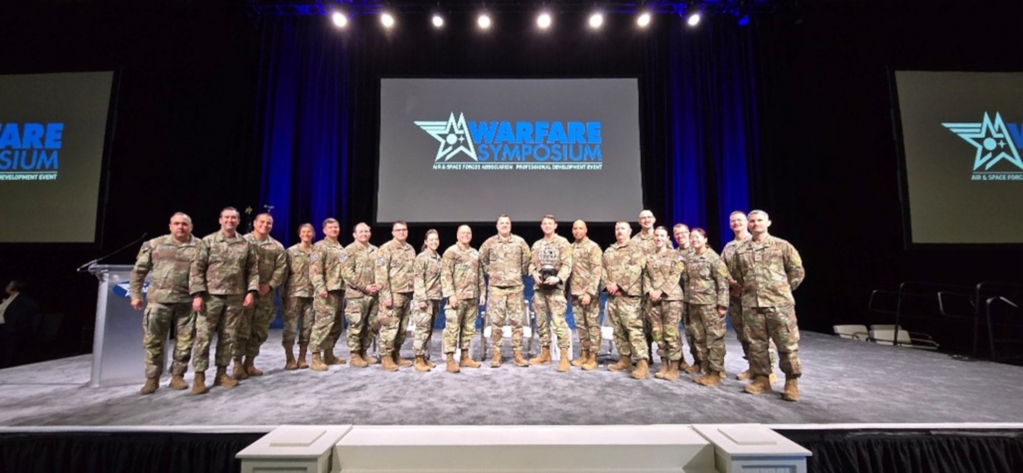 2nd Space Launch Squadron receives the 2025 General Atomics U.S. Space Force Unit of the Year award at Air & Space Forces Association 2026 Warfare Symposium in Aurora, Colo. Feb. 24, 2026. The trophy was presented to the squadron at the AFA Warfare Symposium in recognition of their exceptional contributions to the U.S. Space Force mission and embodiment of its core values. The "Space Cowboys” flight mobilized for 45 days to support the Army’s $361 million ballistic test program and worked for 26 hours to repair a $2 million rocket transport vehicle, ensuring the success of 15 operations and certifying the program’s first overseas launch site. (Courtesy Photo)