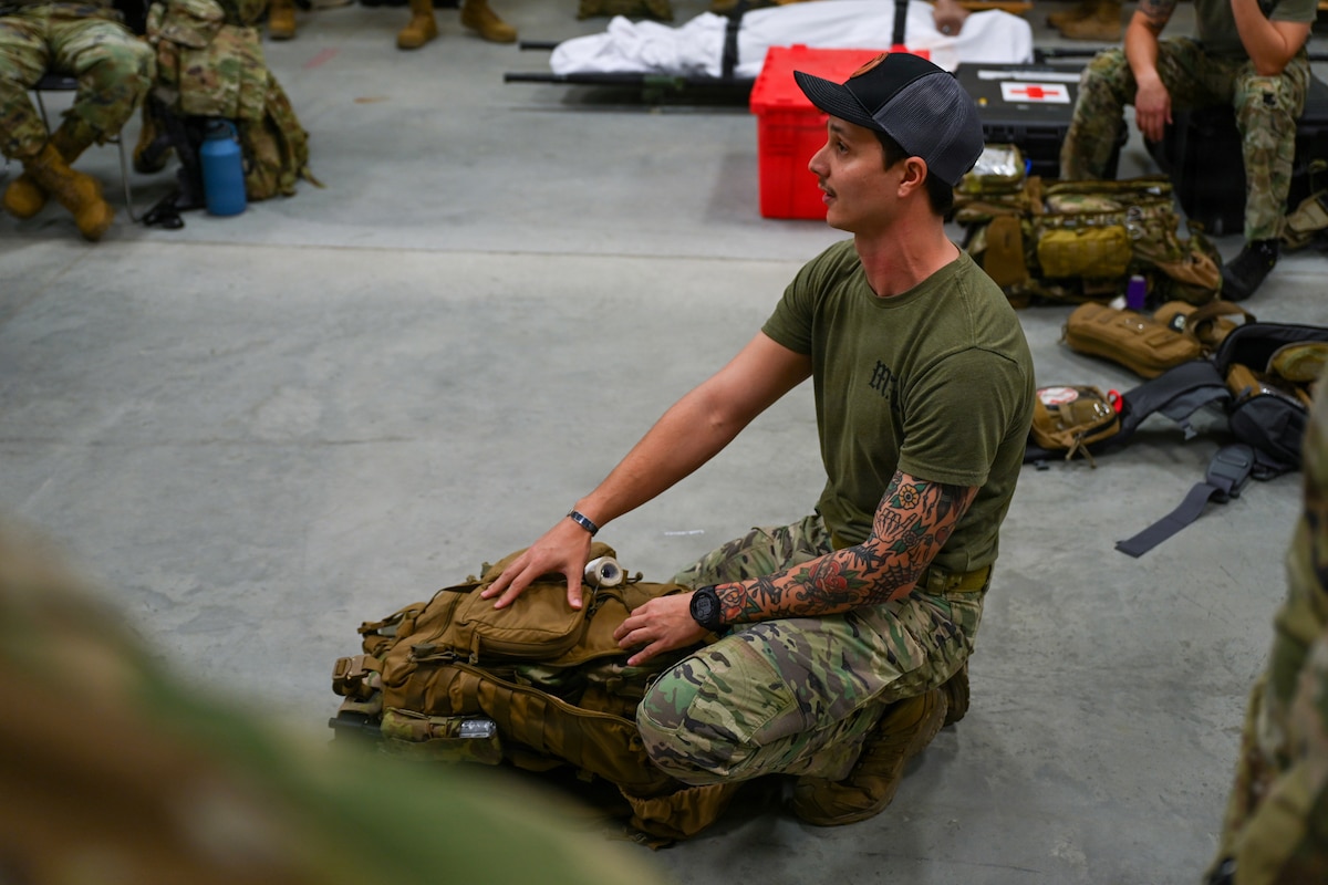 A U.S. Air Force Special Operations Independent Duty Medical Technician assigned to Air Force Special Operations Command demonstrates how to pack a combat life saver bag during the 31st Air Task Force’s second field training exercise at Tyndall Air Force Base, Florida, Feb. 9, 2026. During the exercise, medics assigned to the 31st Combat Air Base Squadron gained proficiency with an air transportable clinic, becoming the first medical personnel to undergo specialized, expeditionary training during an Air Force Unit of Action’s pre-deployment training window. (U.S. Air Force photo by Senior Airman Ty Pilgrim)