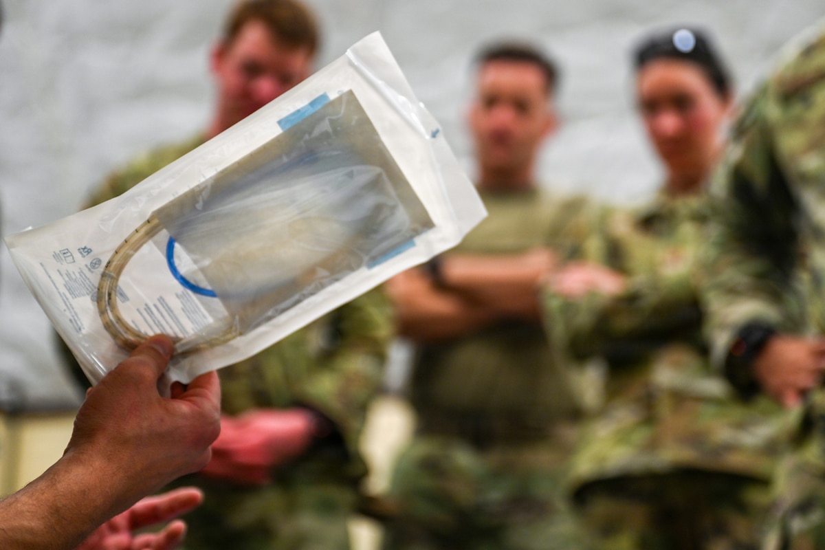 A U.S. Air Force Special Operations Independent Duty Medical Technician assigned to Air Force Special Operations Command demonstrates how to pack a combat life saver bag during the 31st Air Task Force’s second field training exercise at Tyndall Air Force Base, Florida, Feb. 9, 2026. During the exercise, medics assigned to the 31st Combat Air Base Squadron gained proficiency with an air transportable clinic, becoming the first medical personnel to undergo specialized, expeditionary training during an Air Force Unit of Action’s pre-deployment training window. (U.S. Air Force photo by Senior Airman Ty Pilgrim)