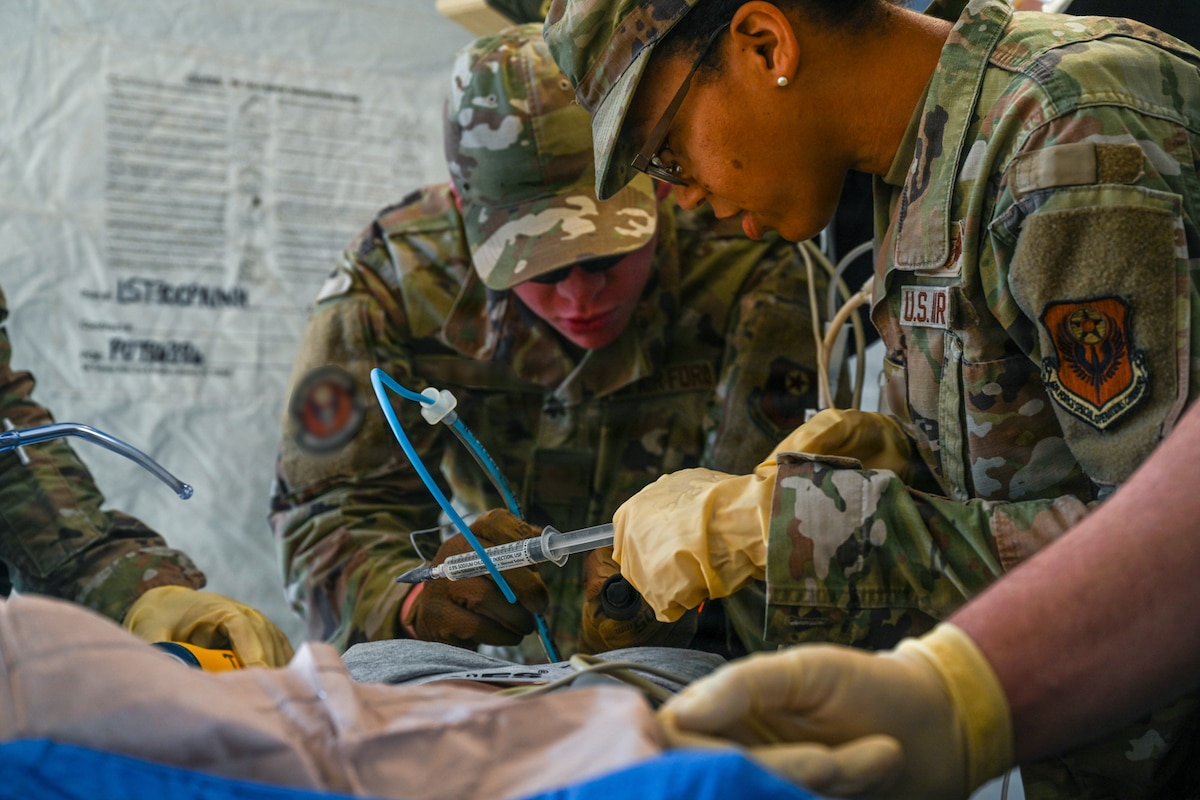 U.S. Air Force medics assigned to the 31st Combat Air Base Squadron participate in specialized pre-deployment training during the 31st Air Task Force’s second field training exercise at Tyndall Air Force Base, Florida, Feb. 9, 2026. Through rigorous field training exercises, 31 ATF readies itself to provide combatant commanders with options to ensure peace through strength in any area of responsibility. (U.S. Air Force photo by Senior Airman Ty Pilgrim)