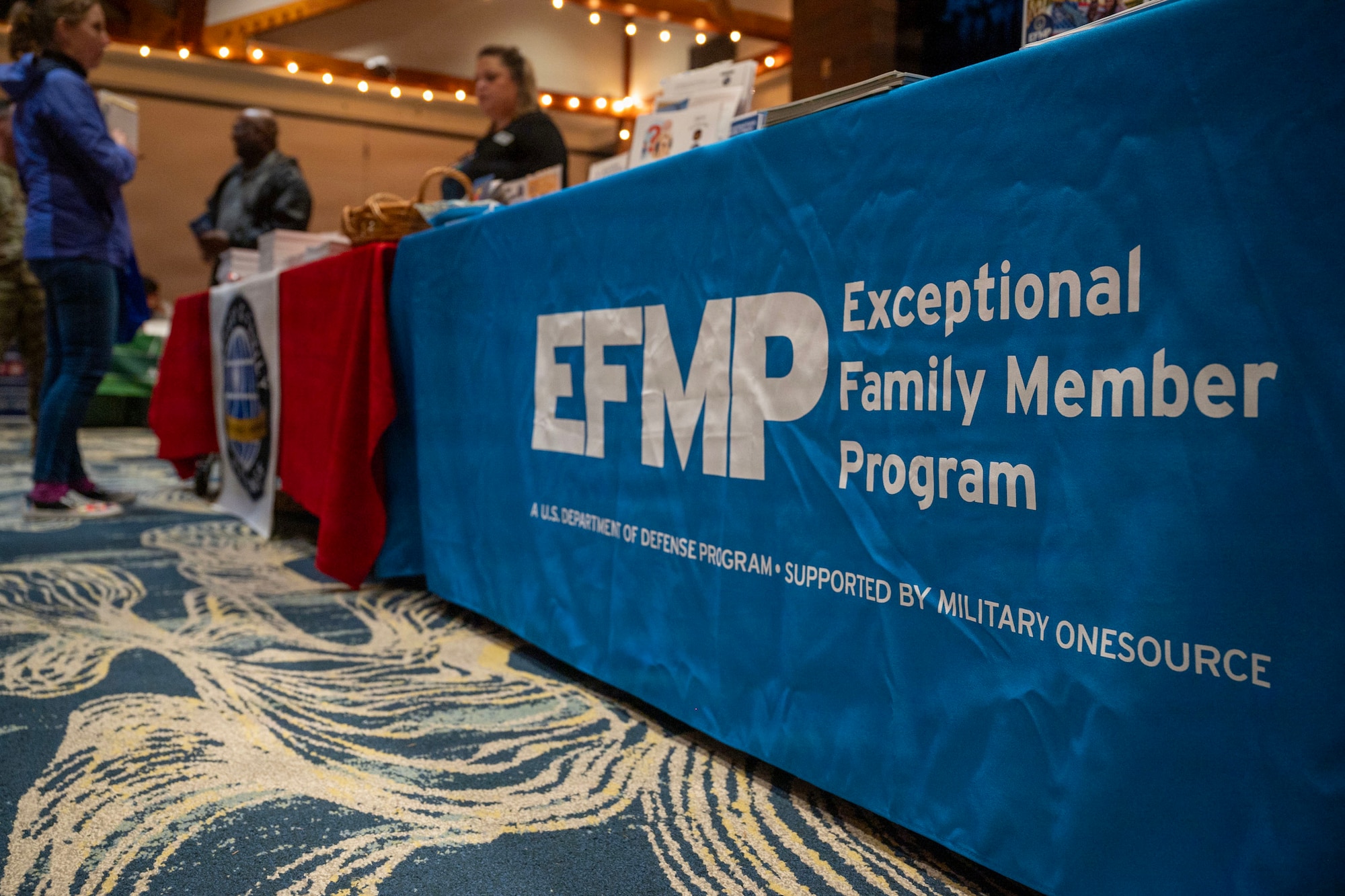 A standing booth with the text "EFMP" on the front taken from the ground