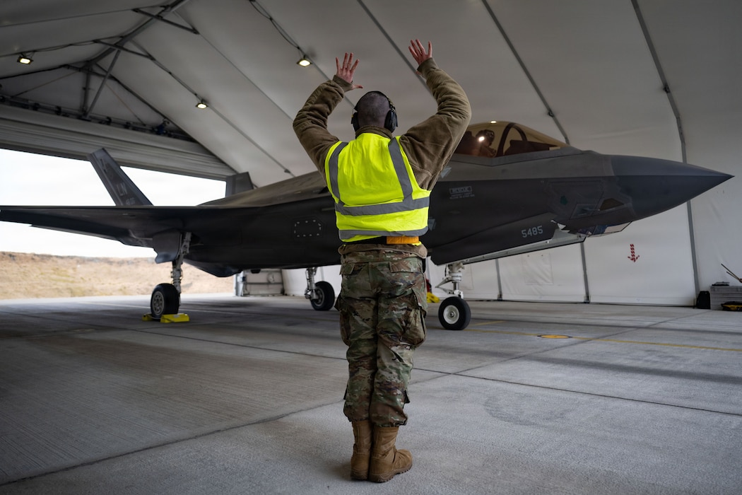 U.S. Air Force Senior Airman Ty Medina, 493rd Fighter Generation Squadron crew chief, signals to the pilot of a F-35A Lightning II aircraft during Exercise Cold Response 26 at Ørland Air Force Station, Norway, March 12, 2026.