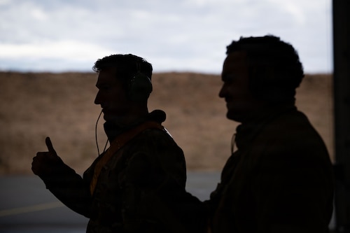 U.S. Air Force 2nd Lt. Chris Stallings, 48th Fighter Wing contracting officer, and Staff Sgt. Richard Johnson, 493rd Fighter Generation Squadron dedicated crew chief, communicate with a pilot via hand signals during preflight checks at Exercise Cold Response 26 at Ørland Air Force Station, Norway, March 10, 2026.