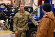 U.S. Air National Guard Master Sgt. Anthony Lesle, 168th Logistics Readiness Squadron, 168th Transportation Flight, discusses vehicle maintenance statuses at the 168th Wing, ensuring fleet readiness in support of operations and winter conditions. (U.S. Air National Guard photo by Senior Master Sgt. Julie Avey)