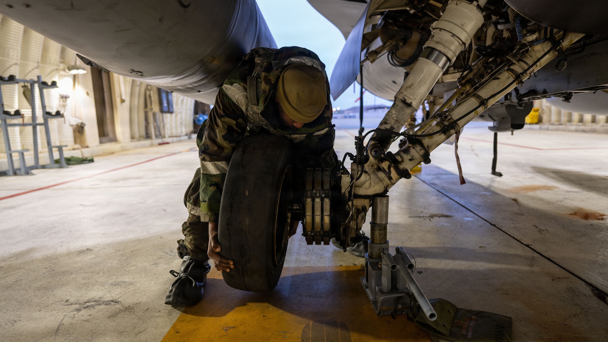 U.S. Air Force Senior Airman Devin Tigner, 36th Fighter Generation Squadron F-16 Fighting Falcon crew chief, changes a tire during exercise Freedom Shield 26 at Osan Air Base, Republic of Korea, March 11, 2026. Training during Freedom Shield tested the 51st Fighter Wing’s ability to disperse aircraft, personnel, and equipment to alternate locations while maintaining mission readiness. (U.S. Air Force photo by Senior Airman Rome Bowermaster)