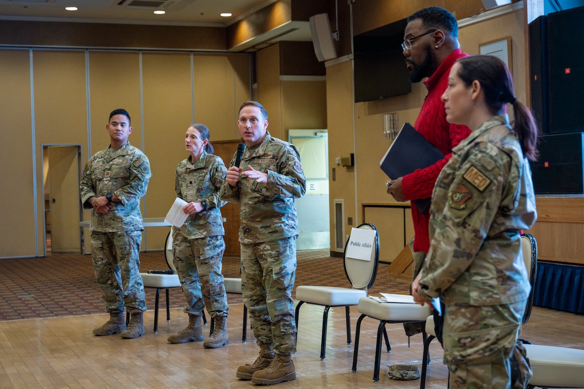 U.S. Air Force Col. Paul Davidson, 35th Fighter Wing (FW) commander, delivers opening remarks with panel members during a 35th FW open forum town hall at Misawa Air Base, Japan, Feb. 18, 2026.