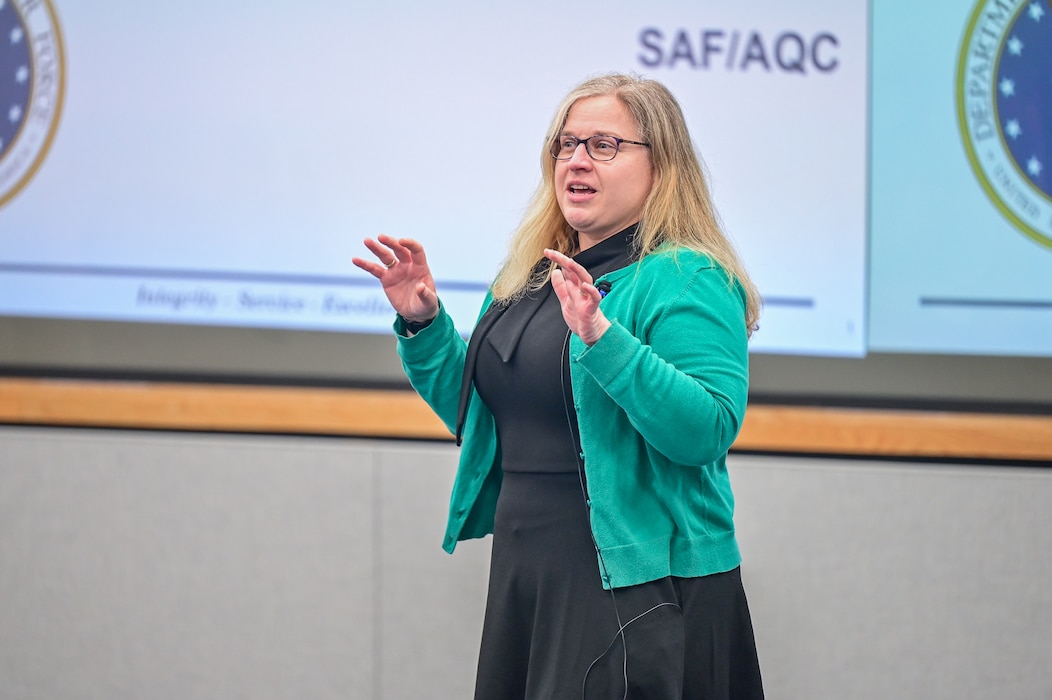 Woman speaking to crowd