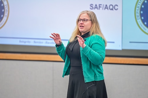 Woman speaking to crowd