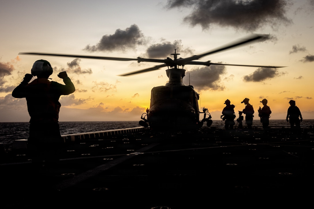 U.S. Marines with Maritime Special Purpose Force, 22nd Marine Expeditionary Unit (Special Operations Capable) board a UH-1Y Venom helicopter with Marine Medium Tiltrotor Squadron (VMM) 263 during a night aerial sniper live-fire aboard San Antonio-class amphibious transport dock USS Fort Lauderdale (LPD 28) while underway in the Caribbean Sea, March 6, 2026. U.S. military forces are deployed to the Caribbean in support of the U.S. Southern Command mission, Department of War-directed operations, and the president's priorities to disrupt illicit drug trafficking and protect the homeland. (U.S. Marine Corps photo)