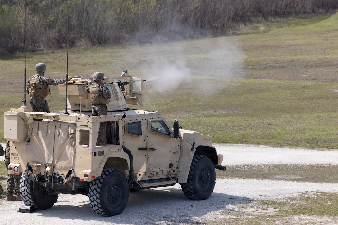 U.S. Marines with II Marine Expeditionary Force Support Battalion, fire a Browning M2A1 .50 Caliber heavy machine gun mounted to a Joint Light Tactical Vehicle during a weapons training exercise at Marine Corps Base Camp Lejeune, North Carolina, March 21, 2026. This training was conducted to improve and sustain the Marines’ mission readiness and their ability to supply II MEF with proper operational support. (U.S. Marine Corps photo by Lance Cpl. Sabine Wilson)