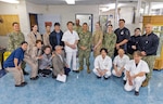YOKOSUKA, Japan (March 16, 2026) – Mr. Katsuo Konno, a master labor contract employee and galley supervisor at U.S. Naval Hospital Yokosuka, stands with staff following a recognition ceremony at the hospital. Konno was honored for his leadership and dedication to galley operations, supporting both patient care and operational readiness. U.S. Naval Hospital Yokosuka ensures warfighter readiness and delivers high-quality health care to forward-deployed forces and their families. (U.S. Navy photo by Daniel Taylor/USNMRTC Yokosuka Public Affairs)
