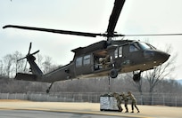 Army Reserve Soldiers from the Texas-based 354th Medical Company participate in sling-load training March 12 during Freedom Shield 2026 at Camp Carroll, Republic of Korea.