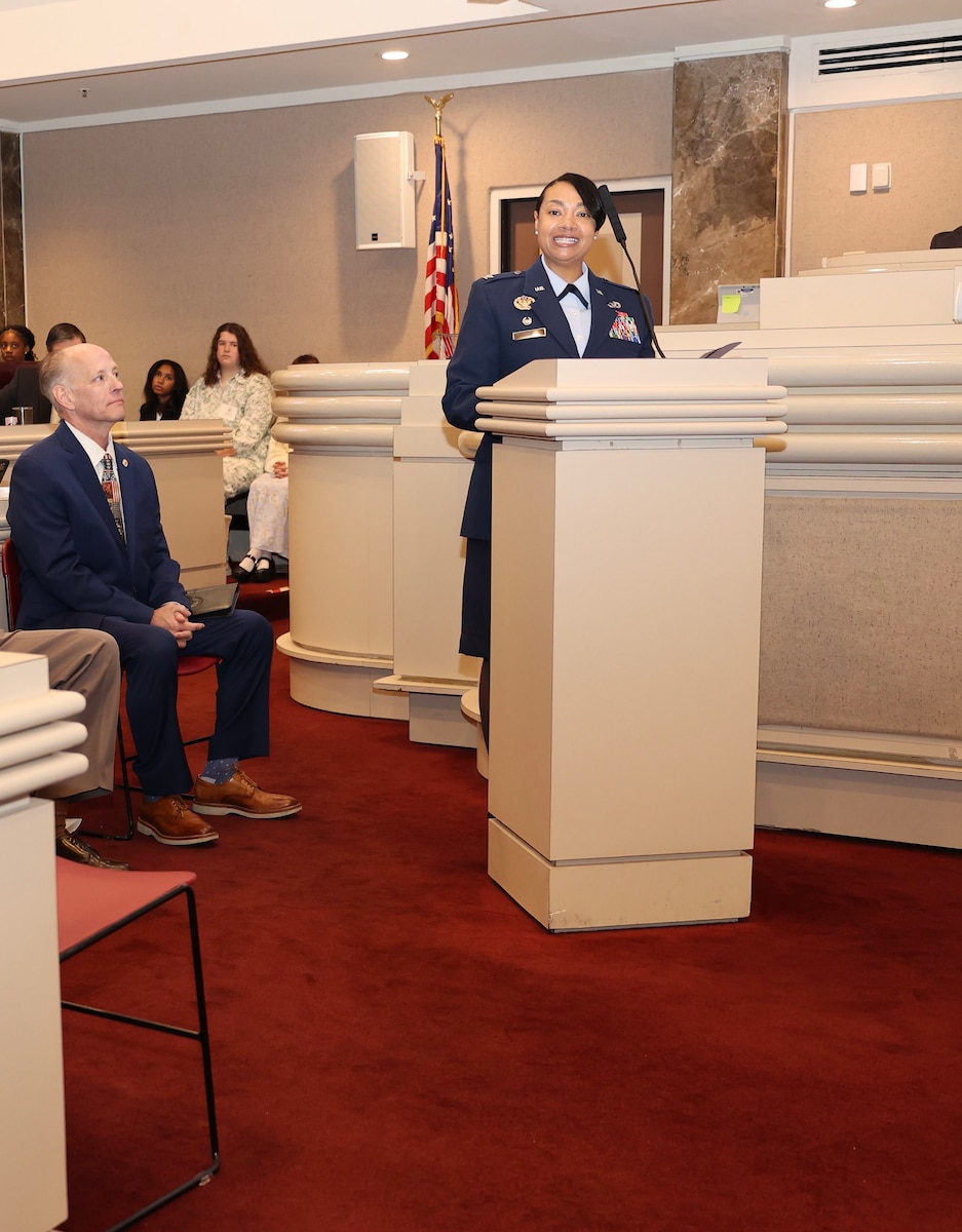 Air Force Col. Shamekia Toliver, 42d Air Base Wing commander, delivers comments at the Alabama State House, March 19, 2026, during a joint session of the legislature.