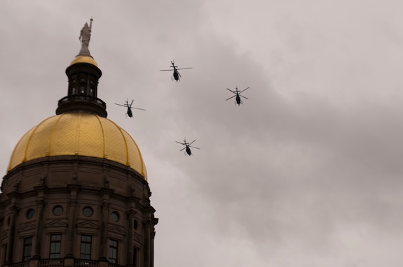 Georgia Army National Guard LUH-72 Lakota helicopters of the 78th Aviation Troop Command fly over the Georgia State Capitol at the close of the ceremonial review of the troops by Governor Brian Kemp during his Jan. 14, 2019 inauguration at the Georgia State Capitol