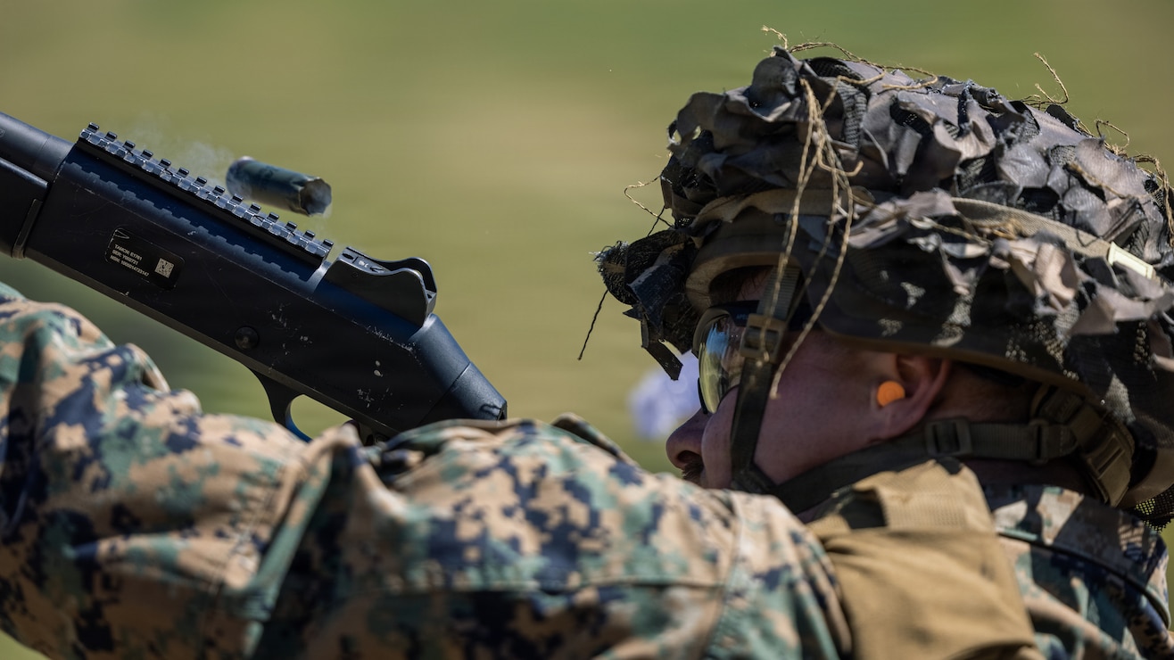 U.S. Marine Corps Sgt. Ean Gibson, a ground electronics telecommunications and information technology systems maintainer, with Combat Logistics Battalion 13, Combat Logistics Regiment 17, 1st Marine Logistics Group, fires an M1014 shotgun during a counter-small unmanned aerial systems shotgun range at Marine Corps Base Camp Pendleton, California, March 18, 2026.