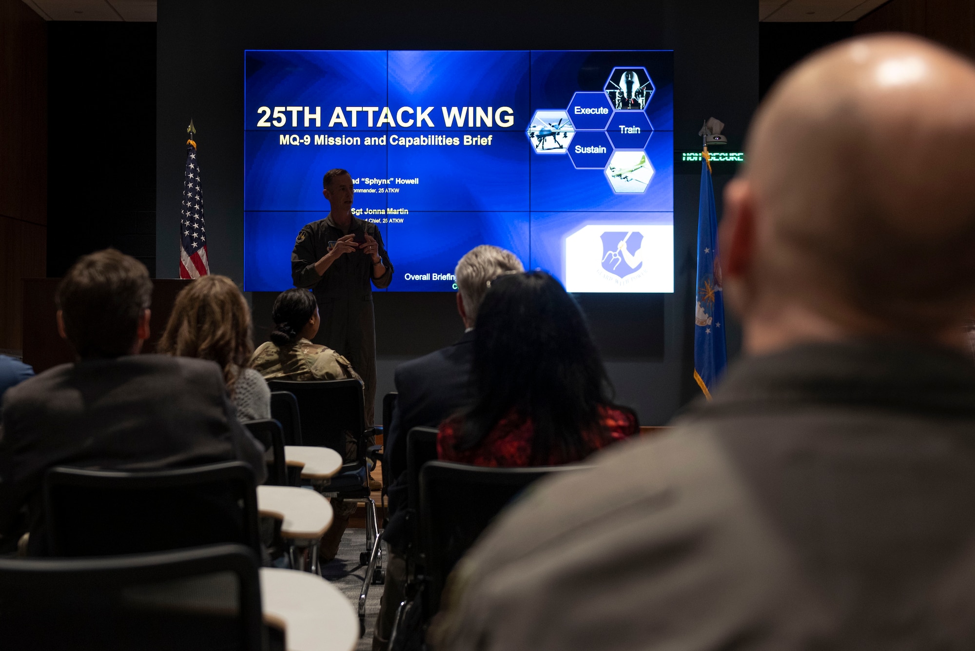 U.S. Air Force Col. Brad Howell, 25th Attack Wing commander, briefs Sumter civic leaders on the 25th ATKW’s mission and MQ-9 Reaper’s capabilities during a tour at Shaw Air Force Base, S.C., March 9, 2026.