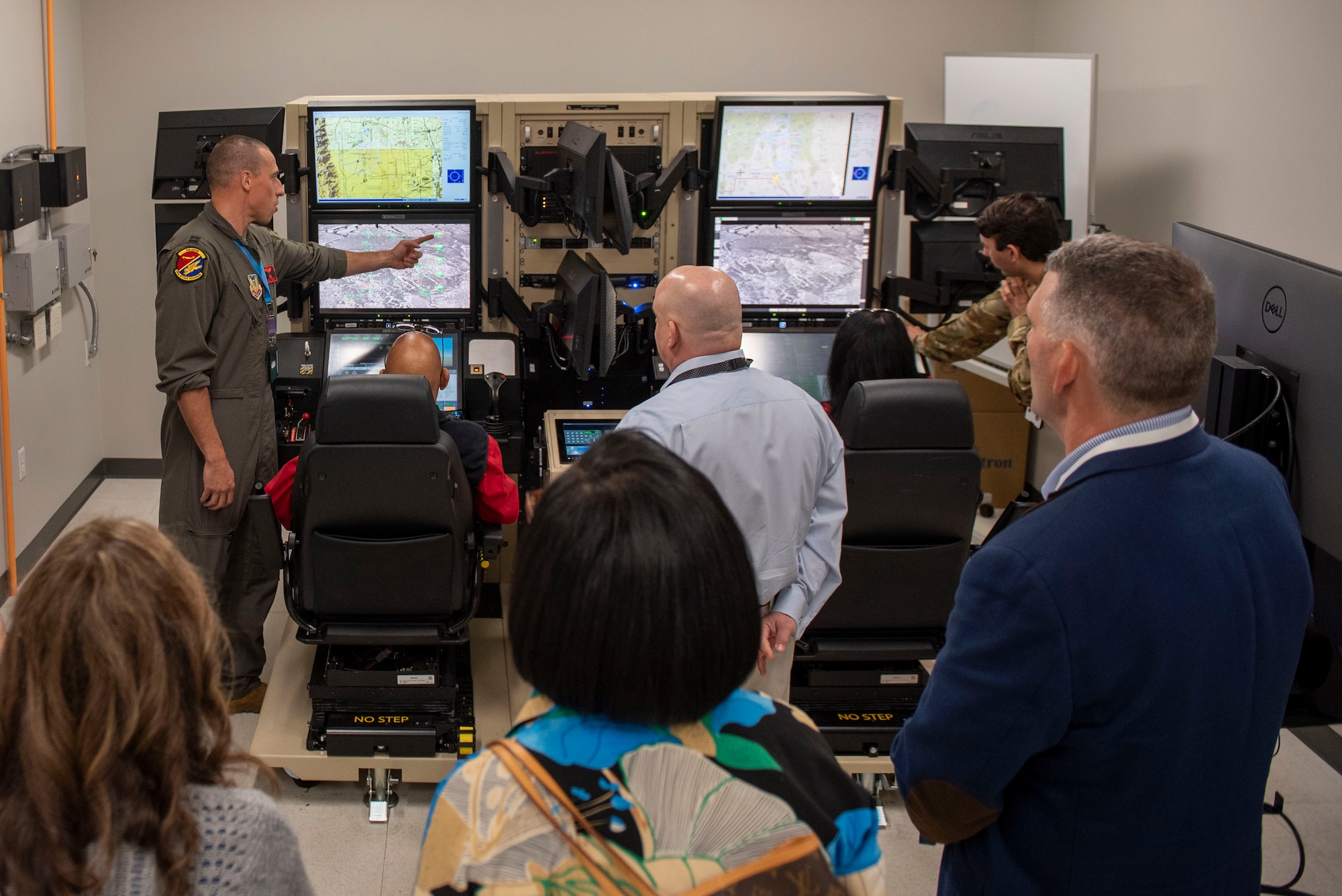 U.S. Air Force members assigned to the 25th Attack Wing direct Sumter civic leaders operating a Ground Control Station simulator at Shaw Air Force Base, S.C., March 9, 2026.