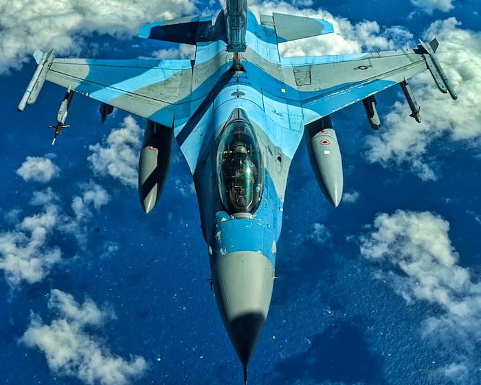 A U.S. Air Force F-16 Fighting Falcon assigned to the 18th Aggressor Squadron, Eielson Air Force Base, receives fuel during Exercise Cope North 20 while above the U.S. Indo-Pacific Command area of responsibility in February 2020.