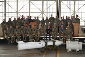 U.S. Air Force nominees from the 898th Munitions Squadron and the 377th Maintenance Squadron pose for a group photo during the Maintenance Professional of the Year (MPOY) ceremony at Kirtland Air Force Base, New Mexico, March 5, 2026. The annual event recognizes the outstanding achievements, technical expertise, and dedication of maintenance personnel who support the mission of the 377th Air Base Wing and its mission partners throughout the year. (U.S. Air Force photo by Airman Maurice Casilla)