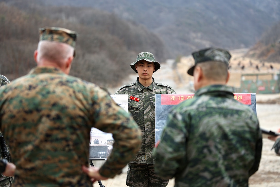 Republic of Korea Marine Corps Lance Cpl. Kim, 1st ROK Marine Division, displays charts to ROK Lt. Gen. Ju Il-Sukz, commandant of the ROK Marine Corps, and Lt. Gen. Roger Turner, III Marine Expeditionary Force commander, during infantry demonstrations while visiting U.S. and ROK Marines participating in exercise Freedom Shield 26 in Pohang, Republic of Korea, March 16, 2026. The exercise prepares participants to respond to a range of emerging threats, including cyber warfare, missile defense, and asymmetric tactics, ensuring a comprehensive approach to national defense. 

(U.S. Marine Corps photo by Master Sgt. Daniel Wetzel)